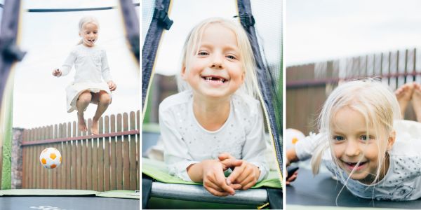 Dziewczynka skacze na trampolinie w Hotelu Białowieski w Białowieży